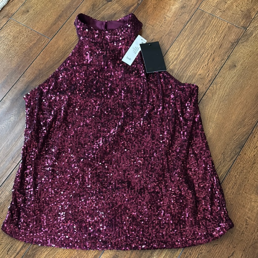 The limited Burgundy Sequin Sleeveless Top